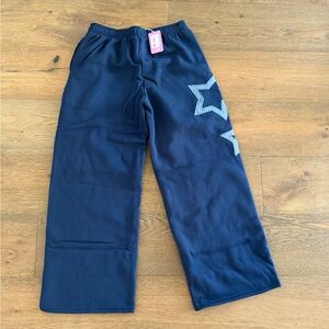 Edikted Navy Track Pants with Star Accent